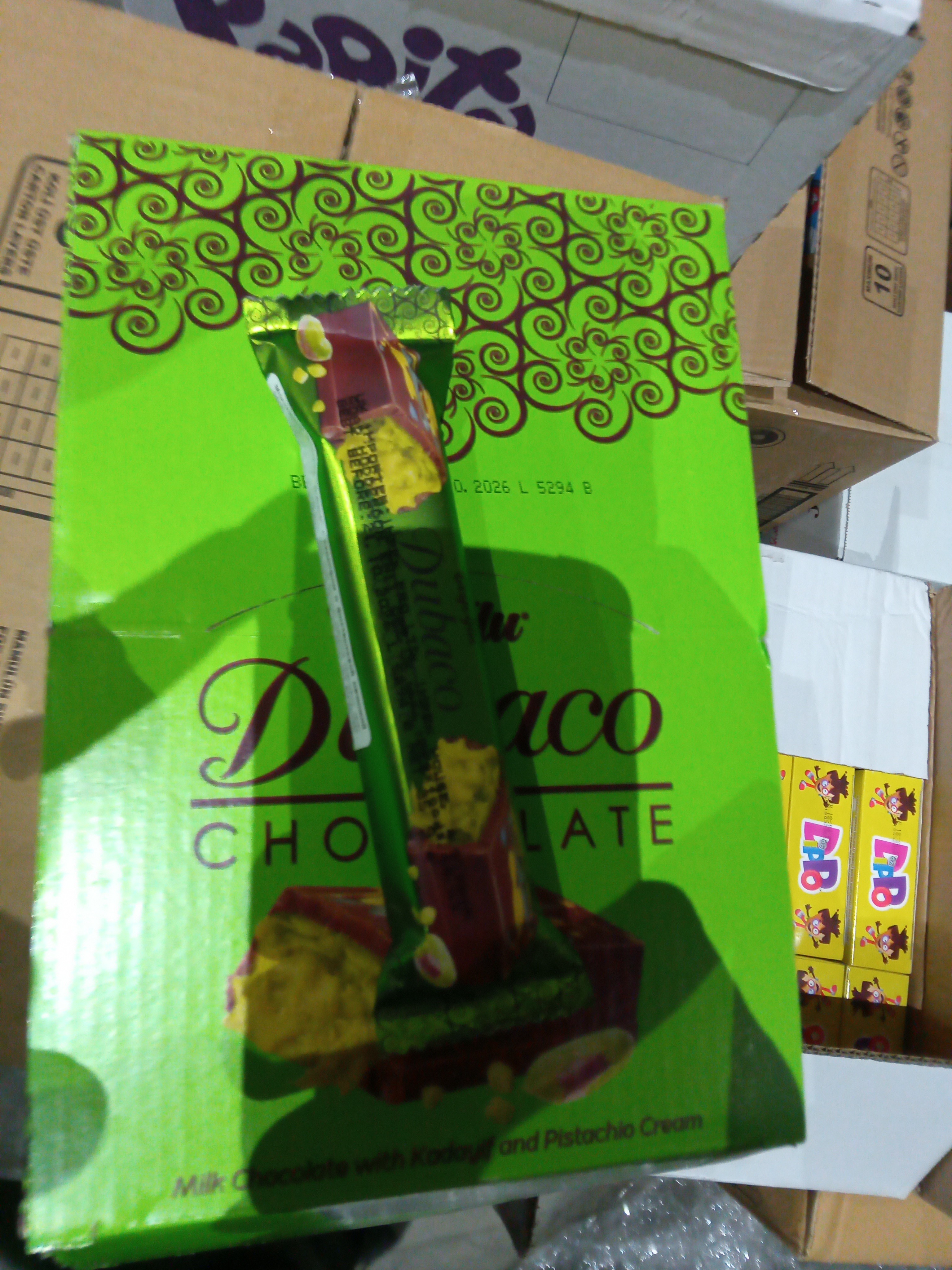 Шоколад Dubaco Молочный шоколад  с кадаифом и фисташковой начинкой   35гр